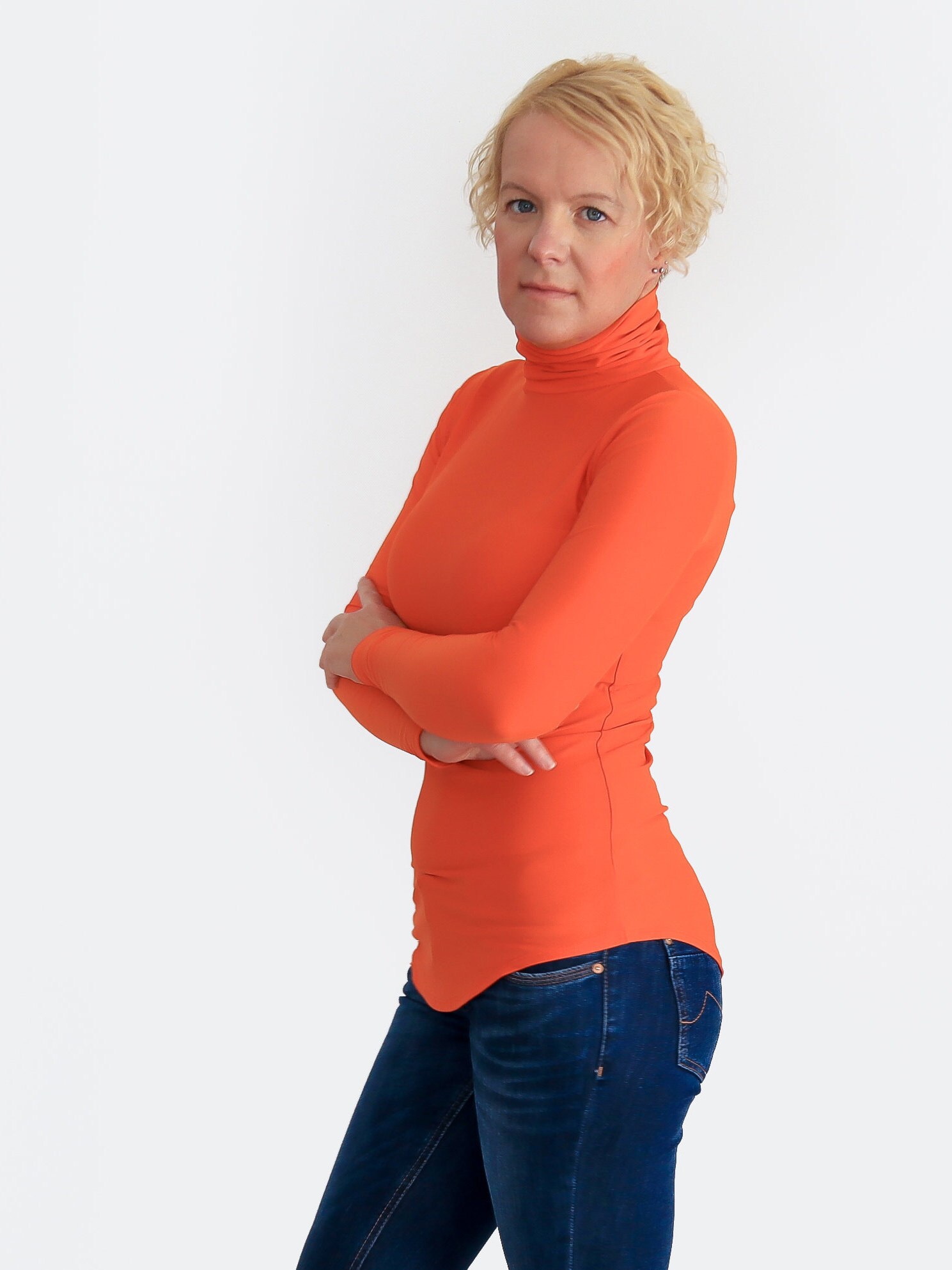 orange turtleneck outfit