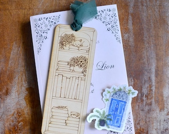Emma M. Lion Bookmark and Lapis Lazuli Sticker – Sleeping Tybalt Cat Bookshelf Design