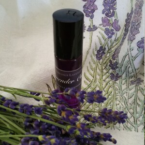 Lavender Essential Oil with a purple roller ball applicator image 2