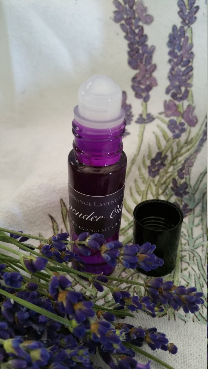 Lavender Essential Oil with a purple roller ball applicator image 1