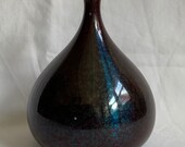 An outstanding antique Japanese bronze enameled vase, signed