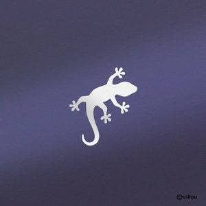 Op de afbeelding: Een wit silhouet van een gekko op een paarse achtergrond.