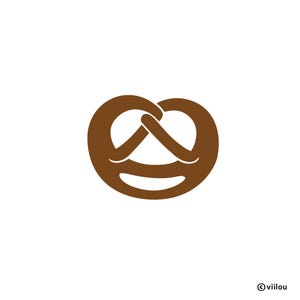 Op de afbeelding: Een bruine pretzel in de vorm van een glimlachend gezicht.