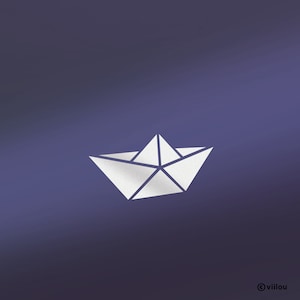 Op de afbeelding: Een wit papieren origami bootje op een paarse achtergrond.
