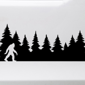 May include: Black silhouette of a Bigfoot walking through a forest of pine trees.