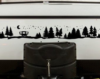May include: A white camper van with a black silhouette decal of a forest scene with a camper, trees, and stars. The decal is on the back of the camper.
