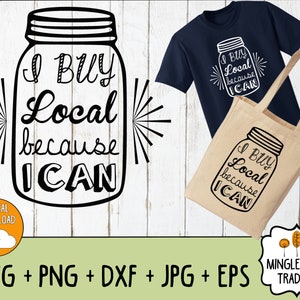 May include: A black and white graphic design of a mason jar with the text "I Buy Local Because I Can". The design is on a white wood background. The design is also on a navy blue t-shirt and a beige tote bag.