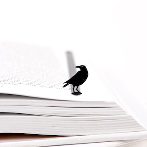 Black bookmark Raven. Perfect choice of a gift for Edgar Allan Poe fans. Great Halloween party favor. Designed and made in Ukraine. Comes in a cute ECO friendly packaging ready to give. Not mass manufactured.