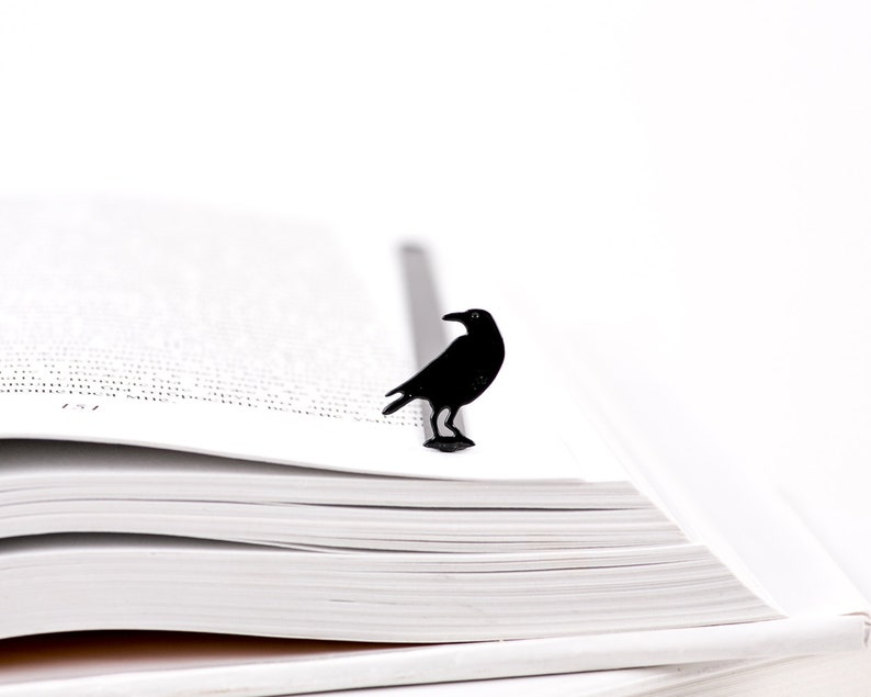 Black bookmark Raven. Perfect choice of a gift for Edgar Allan Poe fans. Great Halloween party favor. Designed and made in Ukraine. Comes in a cute ECO friendly packaging ready to give. Not mass manufactured.