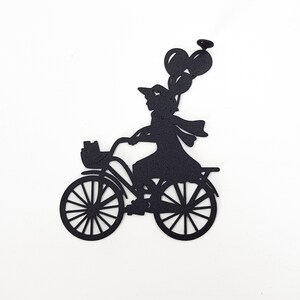 Black metal bike bookmark shaped as a girl riding a bicycle with balloons, shown as a standalone silhouette on a white background.