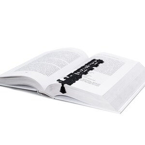 Black metal bookmark Reading Train. The perfect accessory for travel journal - Coolbookmark.