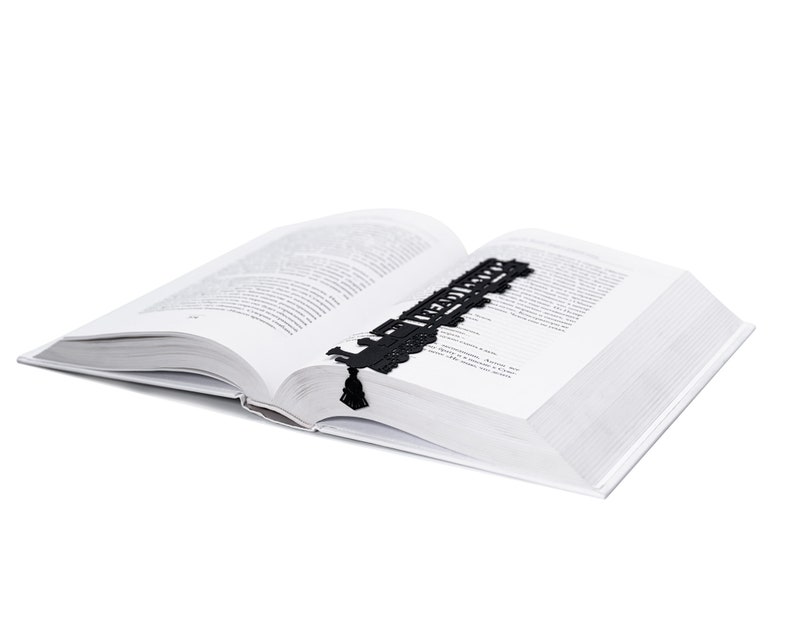 Black metal bookmark Reading Train. The perfect accessory for travel journal - Coolbookmark.