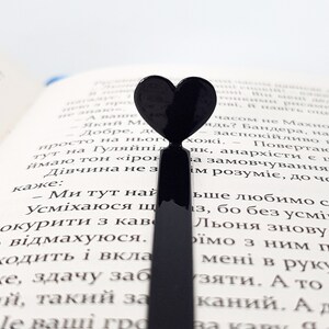 Bookmark Black Heart in the book.