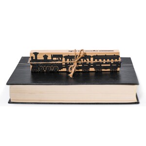 Bookmark for travel journal Reading Train- Coolbookmark.
