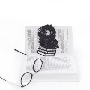 Black metal bookmark Bookworm. Great book party favor. Wonderful gift idea for a book nerd. Created and made by Coolbookmark on Etsy.