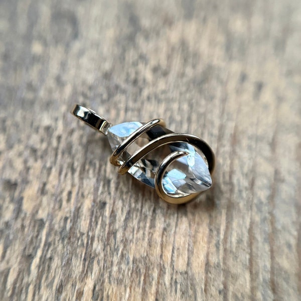 Faceted herkimer diamond in 14k gold pendant