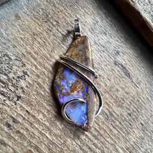 Boulder opal in 14k gold pendant
