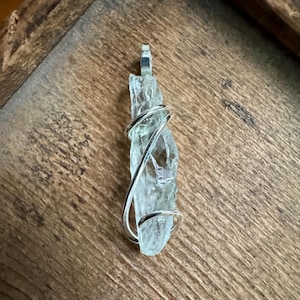 Green amethyst crystal in forged sterling silver pendant