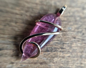 Pink tourmaline in 14k gold pendant