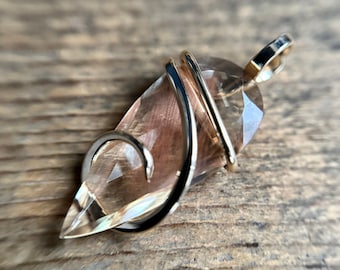 Faceted Oregon sunstone in 14k gold pendant