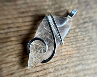 Rutilated quartz in sterling silver pendant