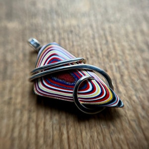 Fordite in forged sterling silver pendant