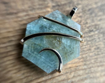 Aquamarine slice in 14k gold pendant