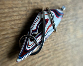 Fordite in forged sterling silver pendant