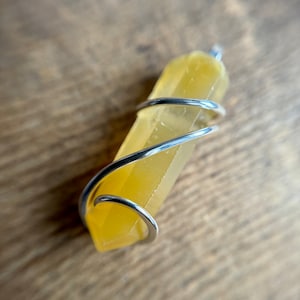 Yellow quartz crystal in sterling silver pendant