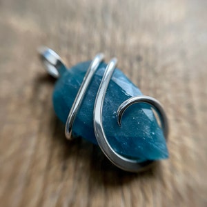 Faceted apatite in sterling silver pendant