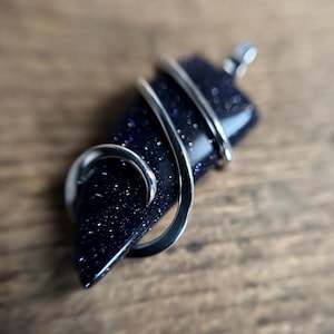 Blue goldstone in sterling silver pendant