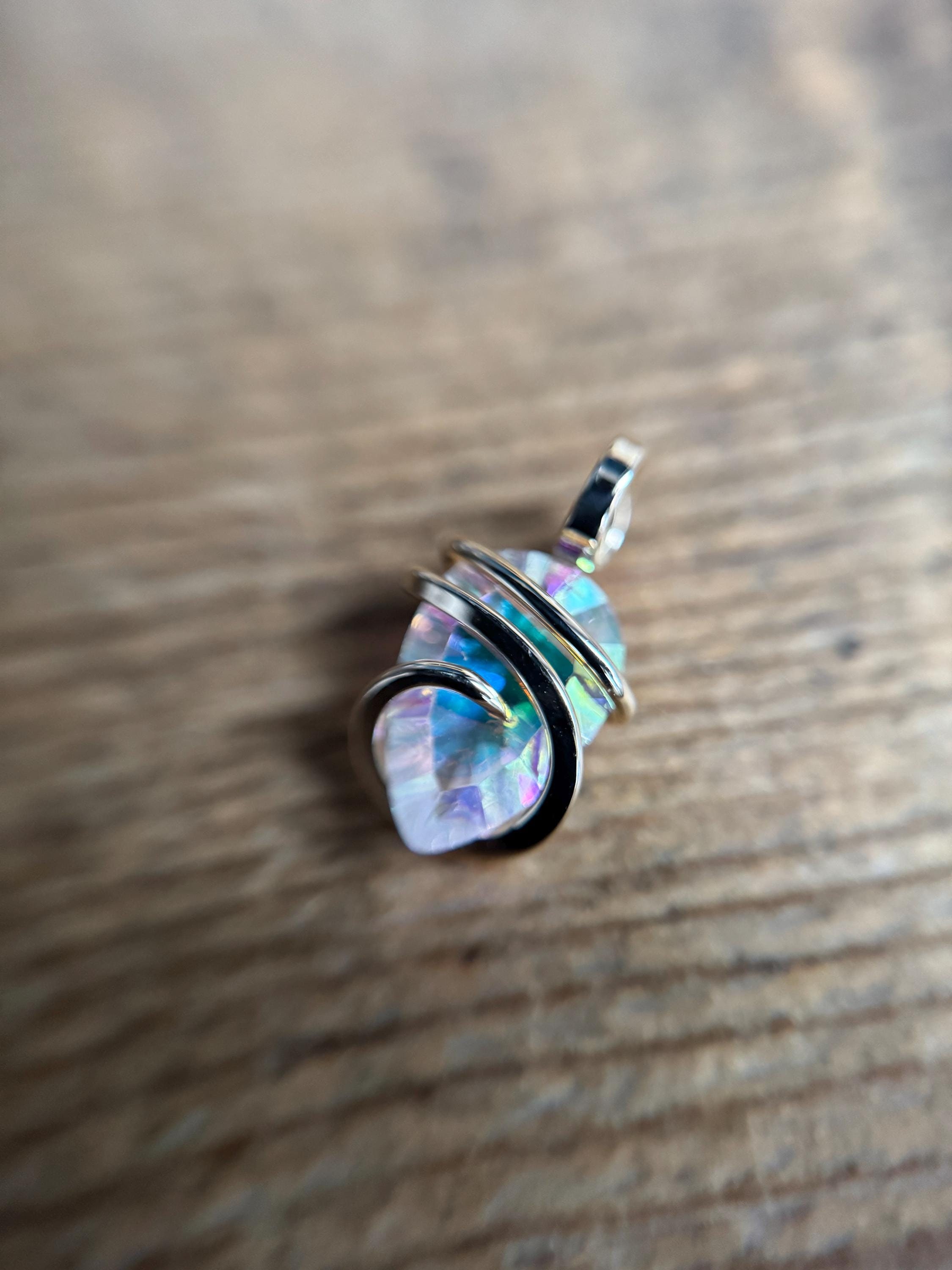 Mystic quartz in 14k gold pendant