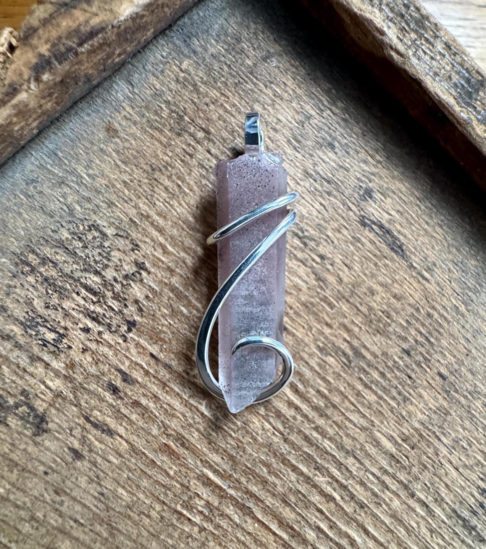 Lithium quartz crystal in sterling silver pendant