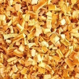 May include: Dried orange peel pieces, a natural ingredient for baking and cooking. The peel is a light brown color and has a slightly rough texture.