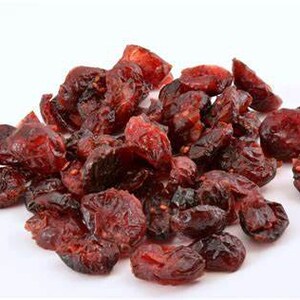 May include: A pile of dried cranberries, a popular ingredient in baking and snacking.