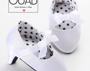 infant white pumps