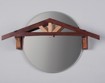 15" round timber frame mirror. Walnut and white oak.