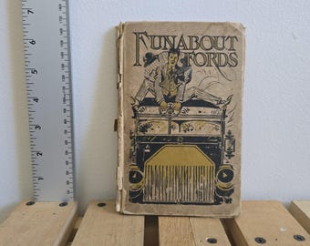 May include: A vintage book titled "Funabout Fords" with a black and white illustration of two people on top of a car.