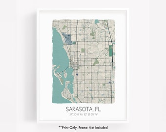 May include: A printable map of Sarasota, Florida with a distressed paper texture. The map shows the city's streets and waterways. The text "SARASOTA, FL" and "27° 20' 8 N/82° 31' 50° W" is printed below the map. The text "Print Only, Frame Not Included" is printed below the coordinates.