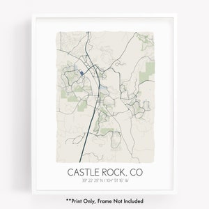 May include: A printable map of Castle Rock, Colorado, with a white background and blue and green lines. The map shows the city's streets and roads, as well as some parks and green spaces. The text "CASTLE ROCK, CO" and "39° 22' 29 N/104° 51' 16" W" is printed below the map. The text "**Print Only, Frame Not Included**" is printed below the coordinates.