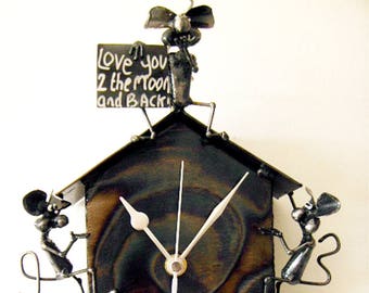 Love Clock with mice blowing kisses saying "I Love You To The Moon And Back!" , with pendulum and  crescent moon.