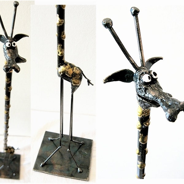 Tall Giraffe Sculpture made from recycled steel with brass markings.