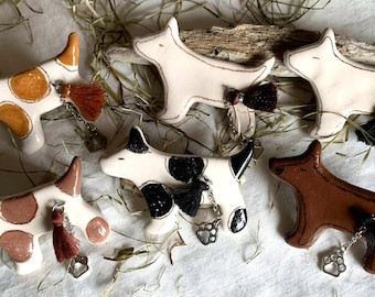 Spille in ceramica a forma di cane