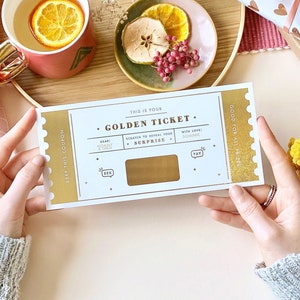 Golden ticket surprise ticket gift is a flexible way of treating your loved one. A shopping spree gift, a holiday gift, a city break or breakfast in bed. This luxurious white and gold foil ticket can be a brilliant last minute gift idea.