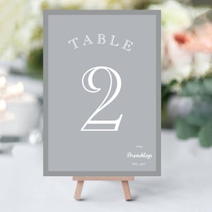 Table Numbers for your wedding tables. A stand out number with your own personalised wedding logo featuring your names and wedding year.