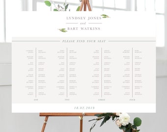 May include: A white seating chart with green foliage accents. The chart lists the names of guests for a wedding reception. The names are organized into four columns labeled "One", "Two", "Three", and "Four". The chart also includes the date "18.02.2019".