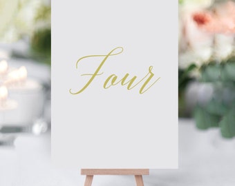 Élégants numéros de table en or | Noms de table simples, numéros de table de mariage en calligraphie, mariage à thème d’or, papeterie de jour blanche et dorée