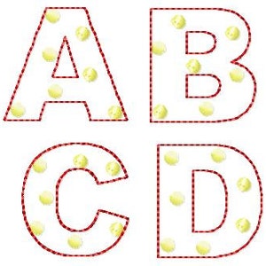 May include: Four red outlined letters, A, B, C, and D, with yellow polka dots on a white background.