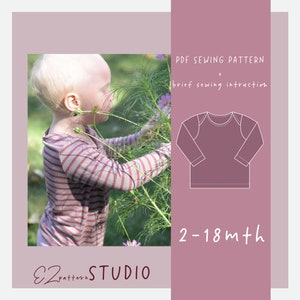 Könnte beinhalten: Ein PDF-Schnittmuster für ein langärmliges Shirt für Babys und Kleinkinder in den Größen 2-18 Monate. Das Schnittmuster enthält eine Strichzeichnung des Shirts und den Text "PDF Sewing Pattern + brief sewing instruction".