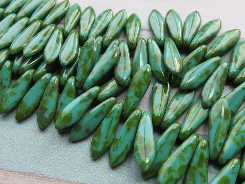 Green Turquoise with Full Picasso Coating Dagger 5 mm by 16 mm Czech Beads 25 beads Item 6877